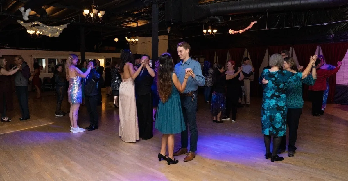 Couples enjoying a dance together at Spotlight Ballroom